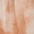 Soft, abstract background with warm beige and peach tones. Gentle, blurry vertical and horizontal streaks create a watercolor or tie-dye effect, giving the image a calm and textured appearance.