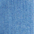 Close-up of a textured blue surface, possibly fabric or paper, showing a pattern of small dots and lines.
