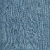 Close-up of blue denim fabric showing detailed texture and vertical stitching lines.