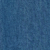 Close-up of a textured blue surface, resembling fabric or paper, with a soft, mottled pattern throughout.