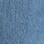 Gros plan dune surface bleue texturée, peut-être un tissu ou un matériau peint, daspect légèrement rugueux et irrégulier.