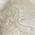 Faint illustration of a snake coiled around itself, depicted in light brown and beige tones on a textured, possibly paper-like background.