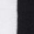 A close-up image showing a clear vertical divide between a white area on the left and a black area on the right, creating a strong contrast between the two sides.