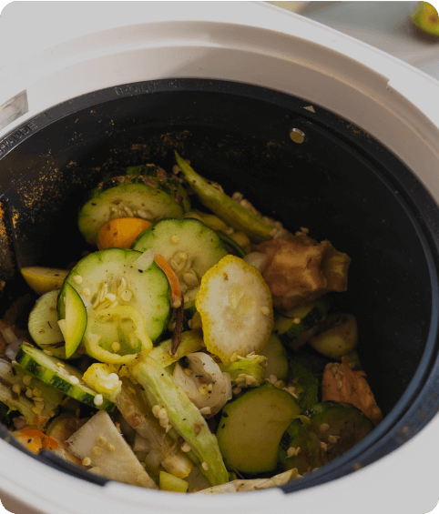 Vegetable scraps in a compost bin