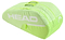 The HEAD BASE 6 Racket Badminton Bag M - SG in lime green features three compartments, a top handle, and showcases "HEAD" in bold white letters. It includes a side zippered pocket for extra storage, perfect for all your tennis essentials.
