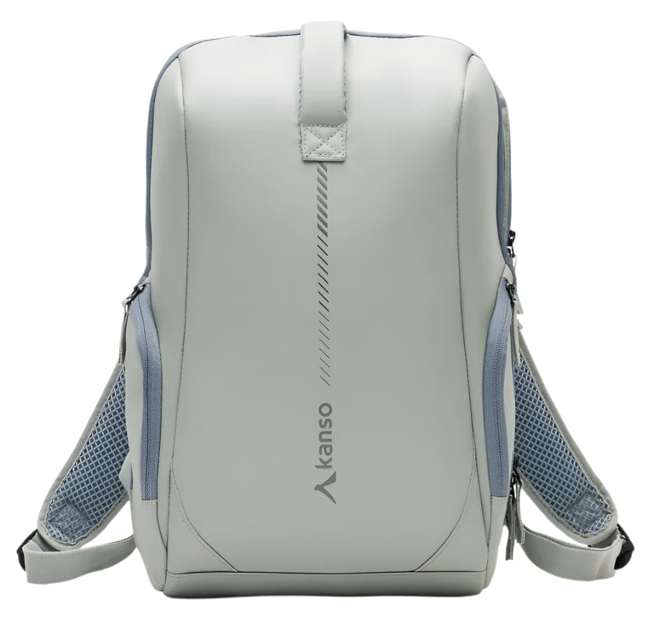 A sleek, minimalist light gray Kanso Intuko Badminton 23L Backpack with "Kanso" printed vertically on the front. It has adjustable mesh straps and a top handle against a white background.