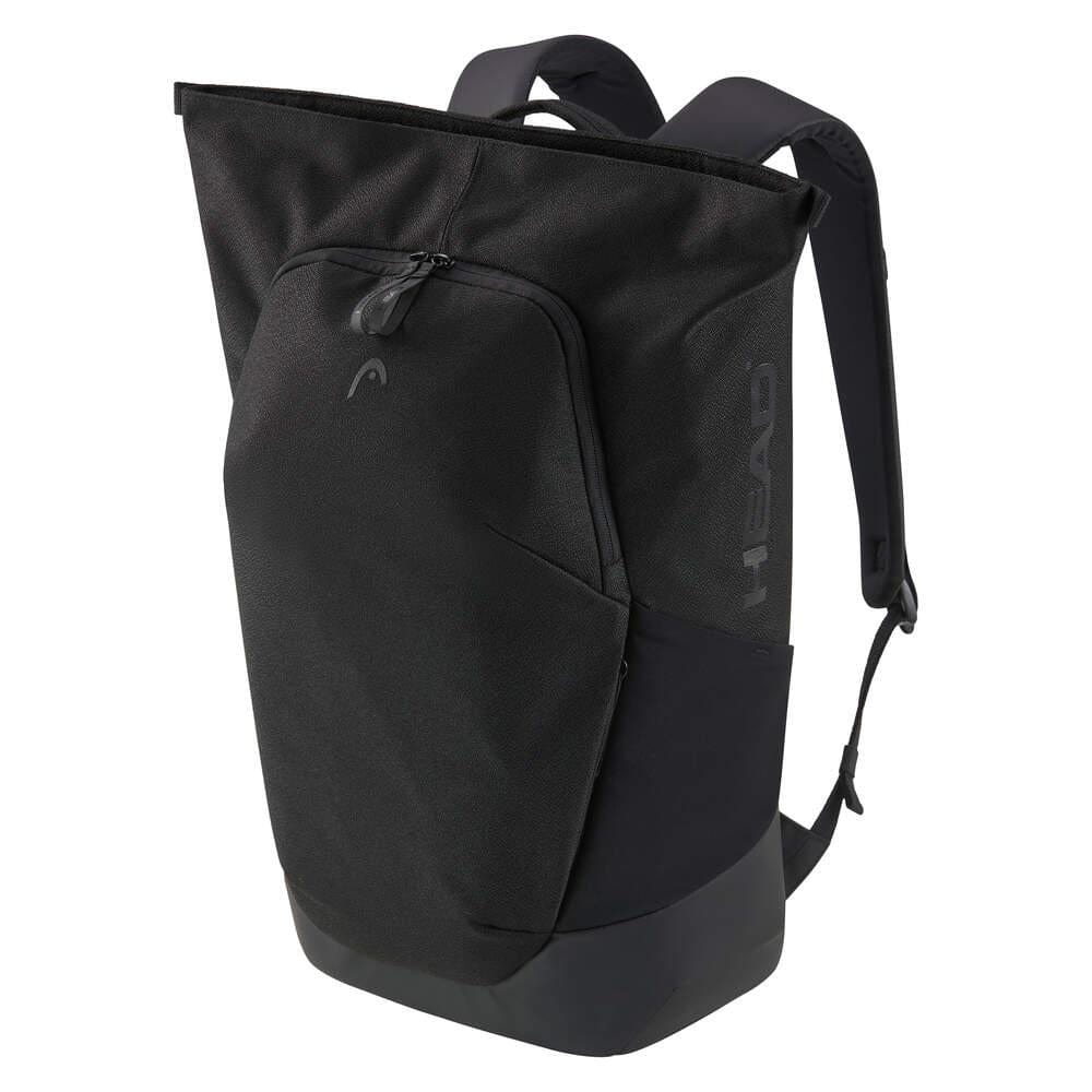 The HEAD Pro X Badminton Backpack 25L - Black features a large front zipper pocket, sturdy shoulder straps, a special racket compartment, an urban minimalist design, and "HEAD" printed vertically on the side.