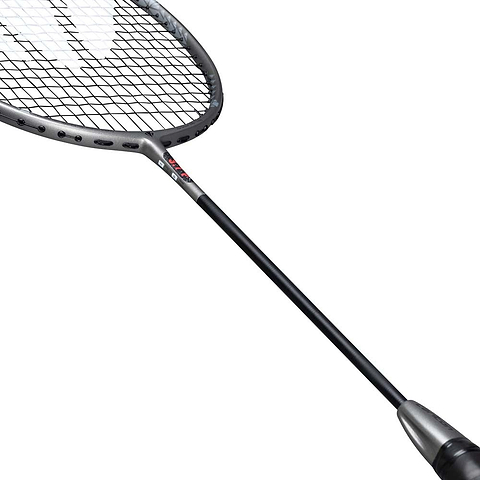 A close-up of the Carlton 3.7P G6 4U Badminton Racket in grey by Carlton, featuring a black handle and a grey power frame, with detailed views of the strings and part of the shaft set against a white background.