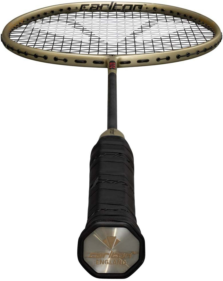 A close-up view of the Carlton 3.7C G6 4U Badminton Racket - Gold highlights its control-focused design with an oval stringed head, extended shaft, and a black grip featuring the Carlton logo on the end cap—ideal for advanced players aiming for precision and top performance.