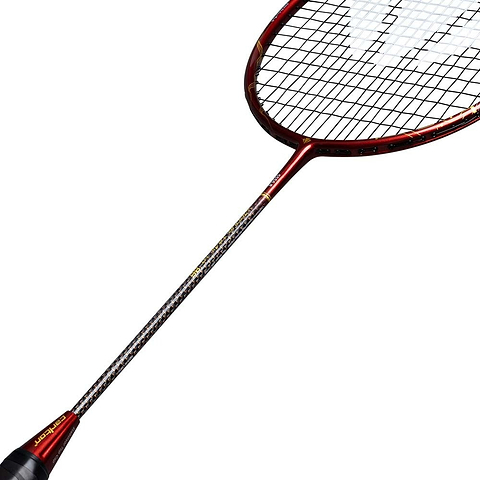 A Carlton Vapour Trail HT 86 G6 3U Badminton Racket in red and black, featuring a thin shaft, mesh-stringed oval head, and a head-heavy balance, is displayed against a white background.