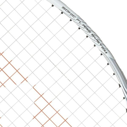 Close-up of the Yonex Nanoflare Nextage 4U Badminton Racket in White/Grey, highlighting the white frame with "SONIC FLARE SYSTEM" and a grid of white and red strings—perfect for intermediate players.