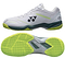 Yonex Power Cushion 65X4 Viktor Axelsen Badminton Shoes in White/Lime, with green and gray accents, mesh upper, and a textured outsole for indoor grip—shown from the side and bottom. This is a Yonex signature model.