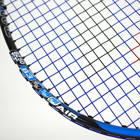 Close-up of the Karakal Black Zone BZ 50 2.1 Badminton Racket's isometric square head, featuring blue strings and a black frame with white, blue, and silver markings. The plain light background accentuates its fast-fibre graphite construction.