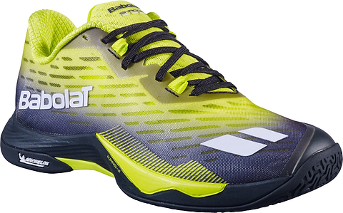 A pair of Babolat Shadow Tour 5 Men's Badminton Shoes in black and lime, featuring white branding, black laces, and a textured sole with the Michelin logo—ideal for players looking for top-quality indoor court footwear.