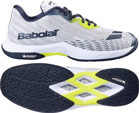 The Babolat Shadow Spirit 2 Men's Badminton Shoes in White/Lime feature grey and white uppers with black laces, vibrant lime accents, and a durable black sole. The images display both a side profile and the sole, highlighting Babolat and Michelin outsole branding. Engineered for top performance on the court, these shoes also include Comfort Soft cushioning to enhance comfort during play.