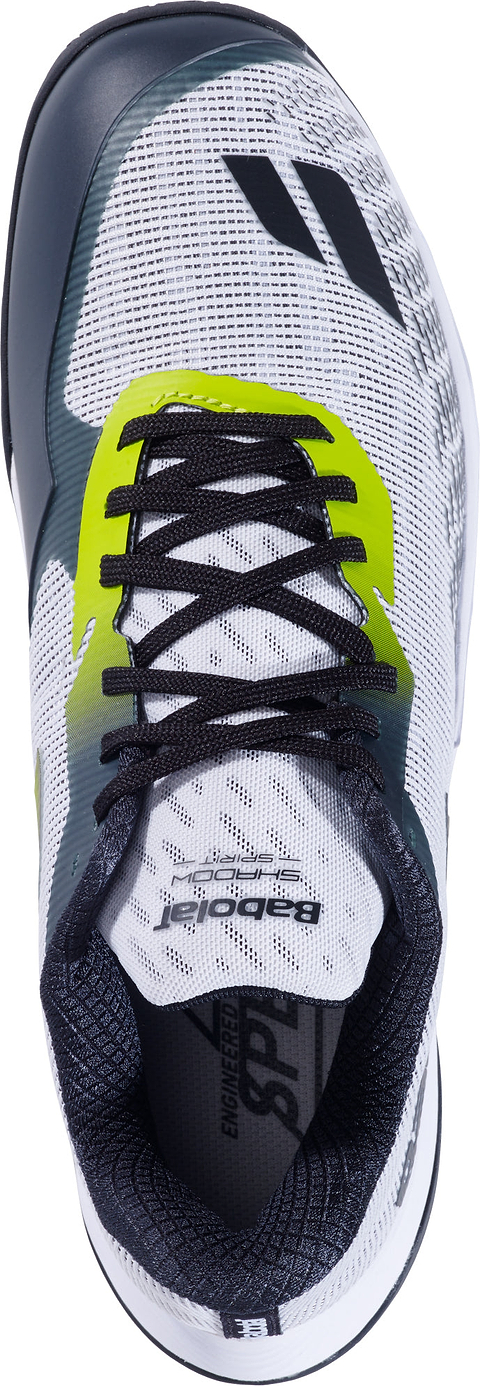 Top view of the Babolat Shadow Spirit 2 Men's Badminton Shoe in white with black and lime accents, featuring black laces and visible Babolat logos on the tongue and side. The shoe boasts a breathable mesh upper, Comfort Soft cushioning for enhanced support during play, and a durable Michelin outsole designed for superior grip on the court.