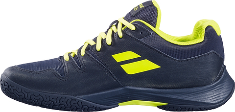 A pair of Babolat Shadow Team 2 Men's Badminton Shoes in black with lime accents, including lime laces, a lime interior, and lime logo details, is shown from the side on a white background. Designed by Babolat as premium indoor court shoes, these badminton shoes offer a durable Michelin outsole for superior traction and performance.