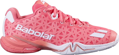 The Babolat Shadow 4 Women's Badminton Shoes in Shell Pink and White feature a white logo, patterned texture, and contrasting white accents. Designed for advanced players, these lace-up shoes provide exceptional stability with a thick sole and display Michelin branding near the heel.