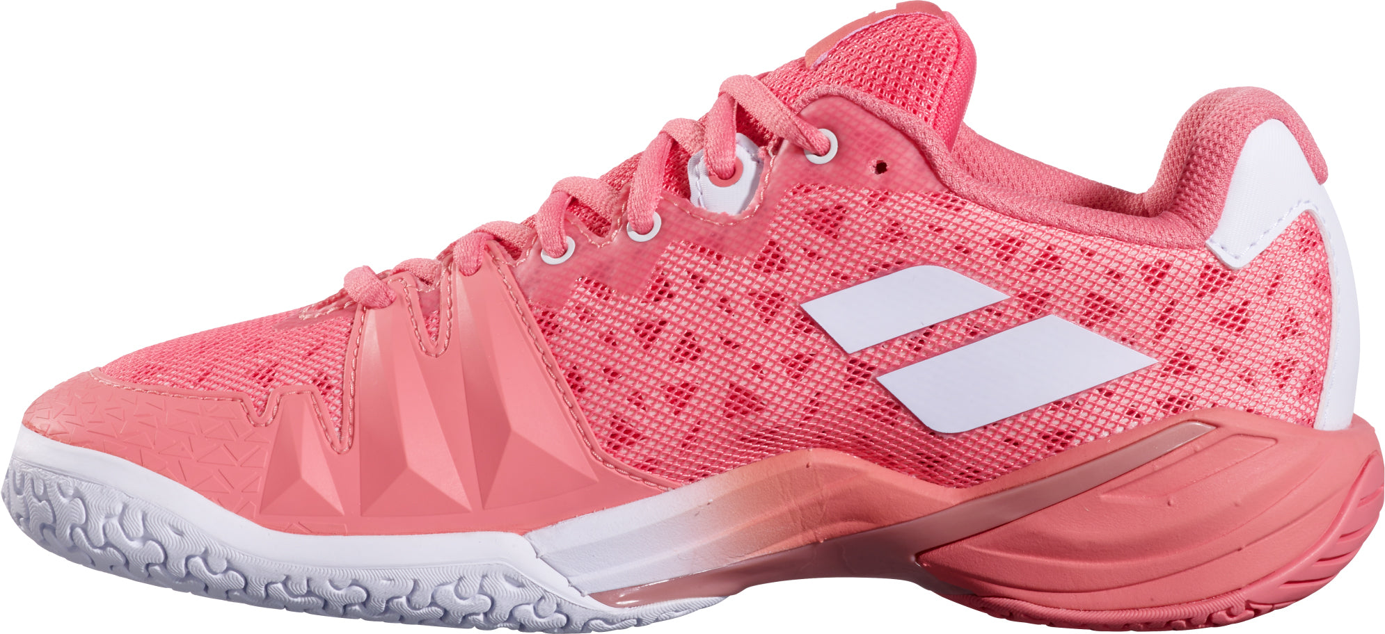 The Babolat Shadow 4 Womens Badminton Shoes in Shell Pink and White feature a stylish pink design with white accents and geometric side patterns, providing a textured sole for advanced players who want enhanced stability on the court.