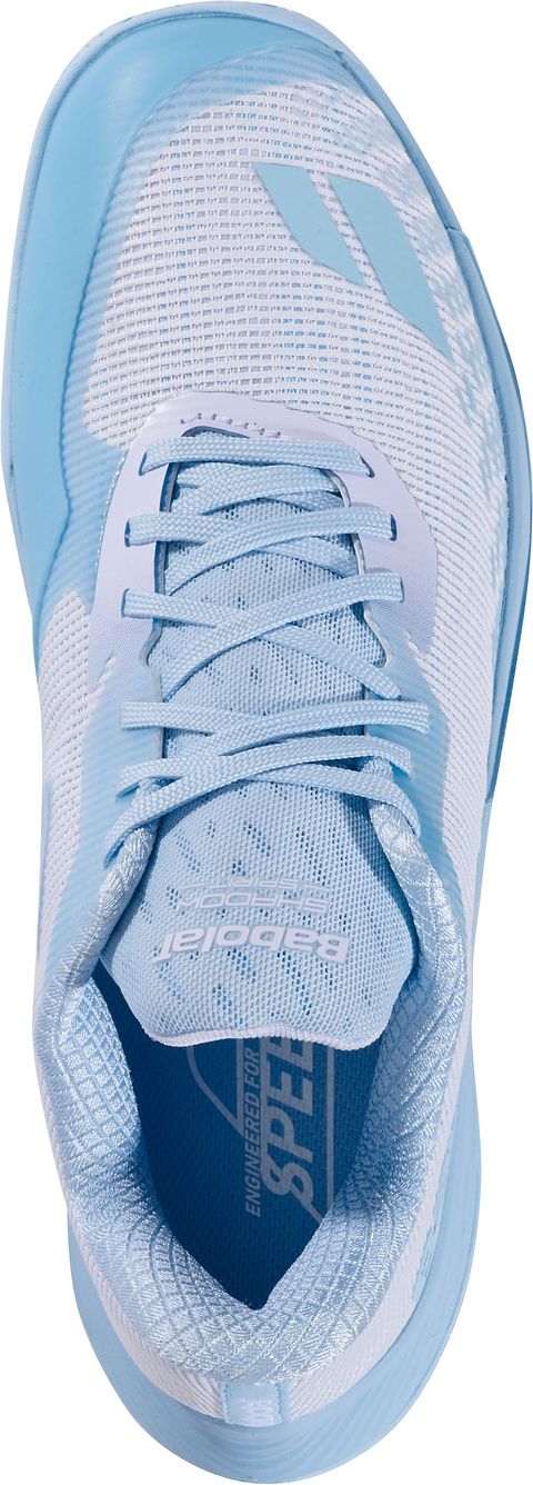 The Babolat Shadow Spirit 2 Womens Badminton Shoes in White/Blue are shown from above, highlighting their laces, mesh texture, and the distinctive Babolat logo on the tongue and side. Engineered for court performance, these shoes offer comfort cushioning and a durable Michelin outsole for superior grip and support.