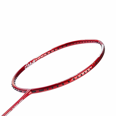 Close-up of the Li-Ning Axforce Cannon Pro 4U Badminton Racket in red, highlighting its frame with black stringing holes. The advanced design rests diagonally against a white background, emphasizing its sleek finish that guarantees power and precision in every swing.