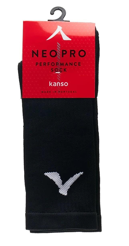 A pair of Kanso Neo Pro Performance Crew Badminton Socks in black with a white geometric toe design, featuring advanced ventilation for breathability. The red packaging reads "NEO PRO Performance Sock by Kanso," and they are made in Portugal.