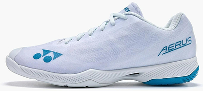 The Yonex Power Cushion Aerus Z2 Men’s Badminton Shoes in white with blue accents, featuring the Yonex logo, "AERUS" text on the side, and advanced Power Cushion technology, are shown from a side profile against a white background.