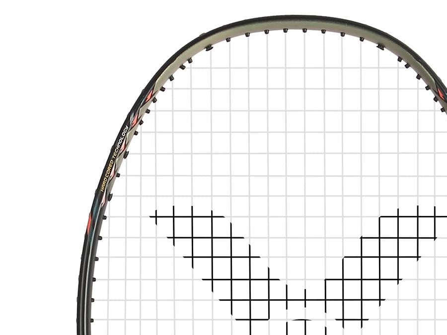 Close-up of the top half of the Victor Thruster Raptor C 4U Badminton Racket by Victor in black and gold, highlighting its "V" string pattern. This attack-oriented racket features Nano Tec technology. The background is plain white.