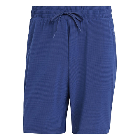 The ADIDAS Ergo Men's Badminton Shorts in navy feature an elastic waistband with adjustable drawstring. Made from recycled materials, they boast a subtle textured pattern for breathable, lightweight comfort.