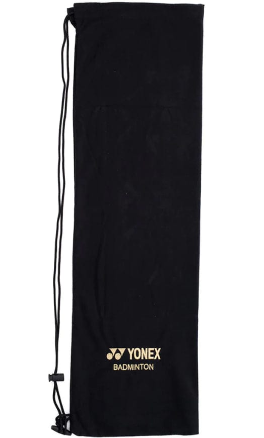 The Yonex AC541 Badminton Racket Soft Cover is a stylish and durable accessory, crafted from black polyester. It comes with a practical drawstring closure and prominently features the iconic Yonex logo alongside "BADMINTON" elegantly printed in gold near the bottom, ensuring your equipment remains protected in style.