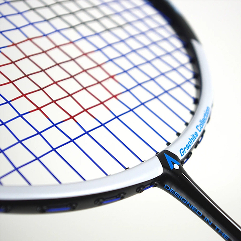 The Karakal Black Zone BZ 50 2.1 badminton racket features a black and blue design, with a white frame and blue/red strings. The handle is black, and "Fast Fibre Graphite Collection" is visible on the Isometric square head of the frame.