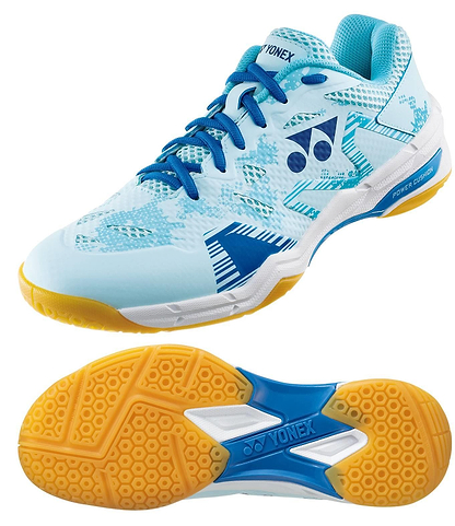 The Yonex Power Cushion Eclipsion X3 Unisex Badminton Shoes in light blue feature blue laces, white and blue patterns, yellow accents with a textured yellow sole, and display the Yonex logo plus "Power Cushion" text on the side.