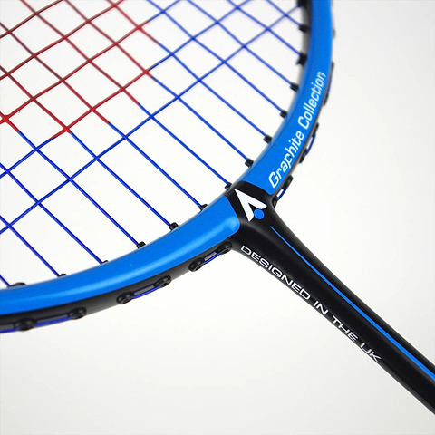 Close-up of the Karakal Black Zone BZ 50 2.1 Badminton Racket in black and blue, with red and blue strings. The "Fast Fibre Graphite Collection" label and "Designed in the UK" are visible, featuring an isometric square head design for enhanced precision.