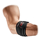 An arm is adorned with the McDavid Tennis Elbow Strap With Pads, featuring visible stitching and a red logo. This black adjustable compression brace wraps around the forearm, delivering pain-relieving pressure just below the elbow. Ideal for combating tennis elbow, it offers both support and comfort against a white background.