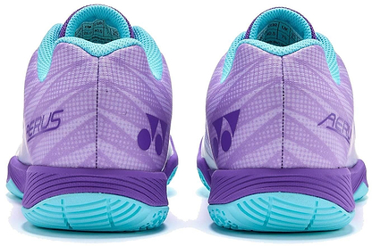A pair of Yonex Power Cushion Aerus Z2 Wide Men's Badminton Shoes in indigo, shown from the back with geometric patterns, Yonex logos, and light blue soles.