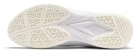 The image displays the white sole of Li-Ning Almighty V2.0 Unisex Badminton Shoes, featuring a textured grip with triangular and star-like patterns for enhanced comfort and traction on the court.