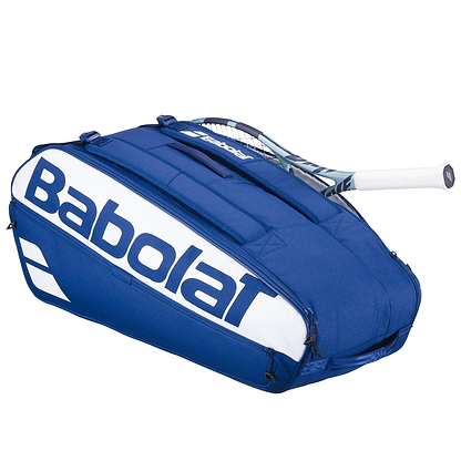 A dark blue Babolat Court L 9 Racket Badminton Bag with a large logo appears partially unzipped, showing a tennis racquet with a white handle inside.