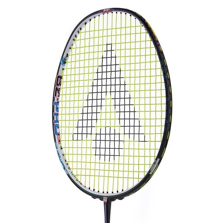 A close-up features the Karakal Black Zone BZ Pro Badminton Racket with a black frame and yellow strings, highlighting its Isometric Head design. The strings display a large black arrowhead logo, indicating the advanced Muscle Tec Technology for improved performance.