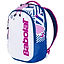 The Babolat Kids Badminton Backpack, made with recycled materials, features a white front, blue sides, pink accents, and geometric-floral patterns. It has black zippers and adjustable straps with the Babolat logo in pink—ideal for tennis and badminton enthusiasts.