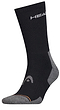 Displayed at an angle, the black HEAD Crew Athletes Badminton Sock features its brand logo at the top and a curved pattern near the ankle for exceptional arch support.