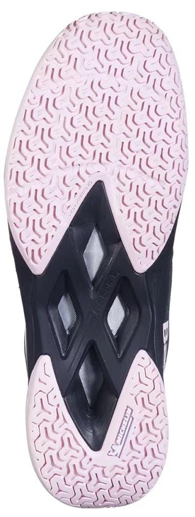 The image displays the sole of the Babolat Shadow Team 2 Women’s Badminton Shoes in Black/Black, featuring a textured geometric pattern with two diamond-shaped cutouts in the center.