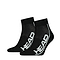 The HEAD Stripe Quarter Socks (2 Pack) in black showcase the word "HEAD" in striking white lettering on the side. These socks are designed with ribbed cuffs, cushioned soles for improved comfort, a mesh-like texture that ensures breathability, and built-in arch support to enhance your everyday steps.
