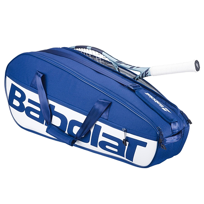 A dark blue Babolat Court M 6 Racket Badminton Bag with zipper and handles, made from recycled PET, holds a racquet with a white grip partially visible from the open compartment.