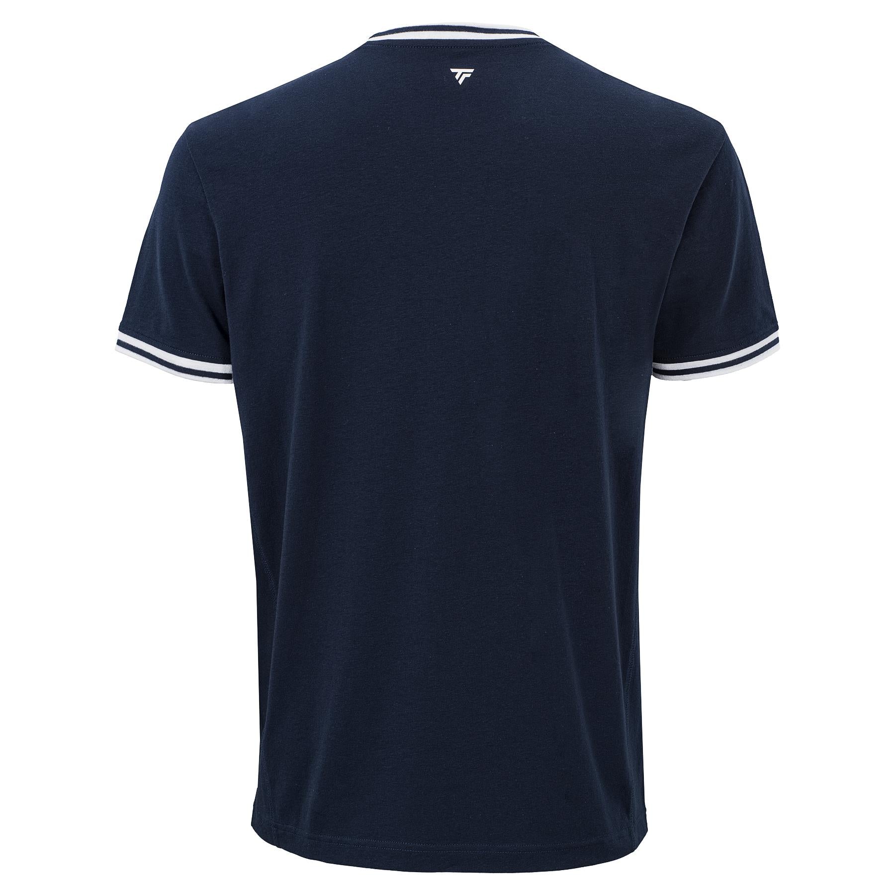 The Tecnifibre Team Stretch Mens Badminton T-Shirt in Marine Blue is shown from the back, featuring white trim on the collar and sleeves plus a small white logo below the neckline. Designed as a men's performance t-shirt by Tecnifibre.