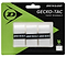 The packaging for the Dunlop Gecko-Tac Badminton Overgrip - 3 Pack - White is predominantly green and black, displaying three white rolls that offer enhanced control through a transparent plastic window. The design prominently features the Dunlop logo and emphasizes its tacky surface technology.