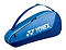 The Yonex 42523EX Team 3 Racket Badminton Bag in Blast Blue features durable YKK zippers, a convenient shoulder strap, and the white Yonex logo on the side for both style and functionality.