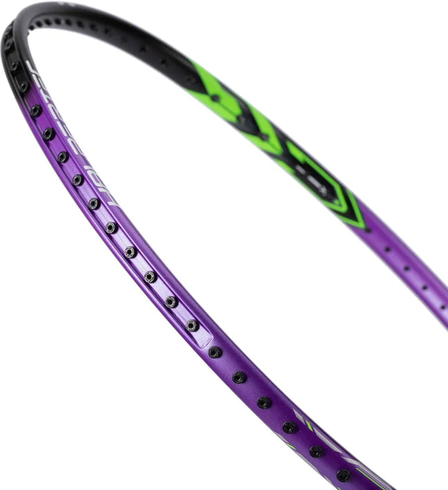 Close-up of the Li-Ning Halbertec 1000 Badminton Racket - Dragon Purple, highlighting its purple and black frame with green accents and focusing on the grommet holes along the edge for enhanced control during play.