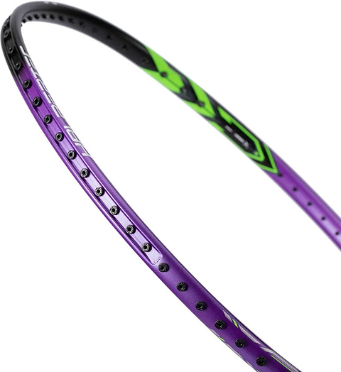Close-up of the Li-Ning Halbertec 1000 Badminton Racket - Dragon Purple, highlighting its purple and black frame with green accents and focusing on the grommet holes along the edge for enhanced control during play.