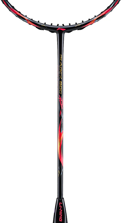 Close-up of the Li-Ning BladeX 800 Power Badminton Racket - Lava Red, showing its black and red design, M46X carbon shaft, yellow "3D CALIBAR 900" text with flame graphics, and prominent Li-Ning branding on the handle.