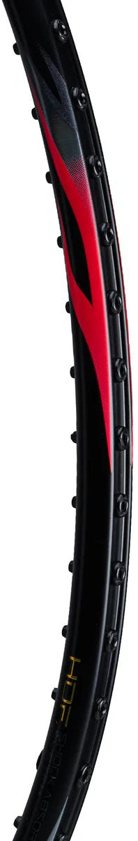 Close-up of the side frame on the Li-Ning BladeX 800 Power Badminton Racket - Lava Red, showing black and red design, string holes, gold "HDF" text near the bottom, and high-strength M46X carbon construction.